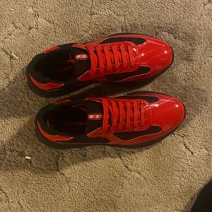 Black and red pradas